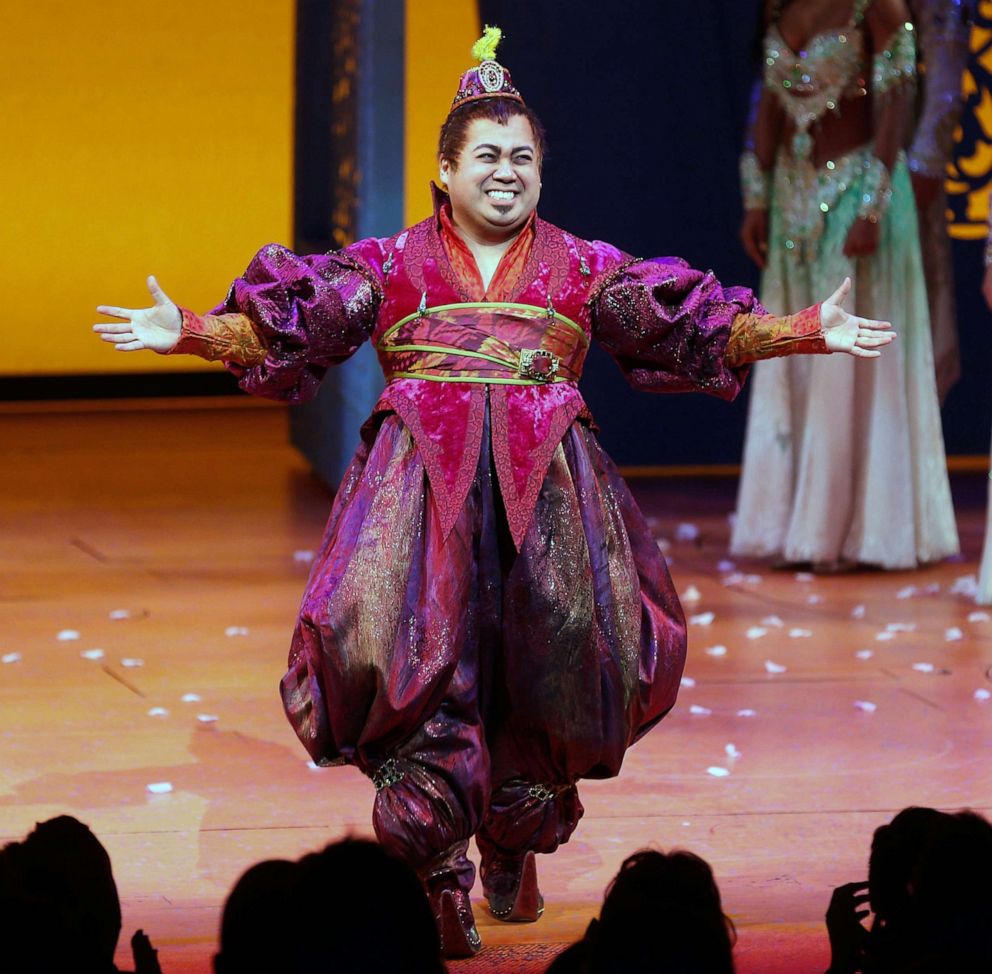 PHOTO: Actor Don Darryl Rivera takes a bow during curtain call at the the "Aladdin" On Broadway Opening Night at New Amsterdam Theatre on March 20, 2014 in New York City.