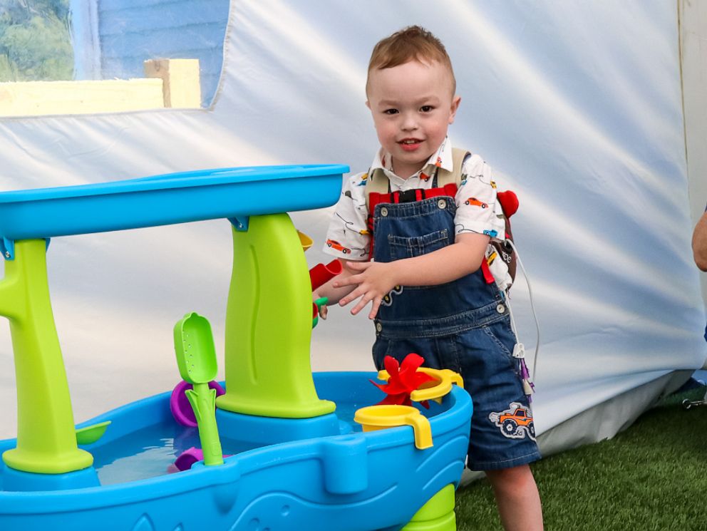 PHOTO: Brody, 4, of Griswold, Connecticut, plays in the tented outdoor area made for him by Make-A-Wish Connecticut.