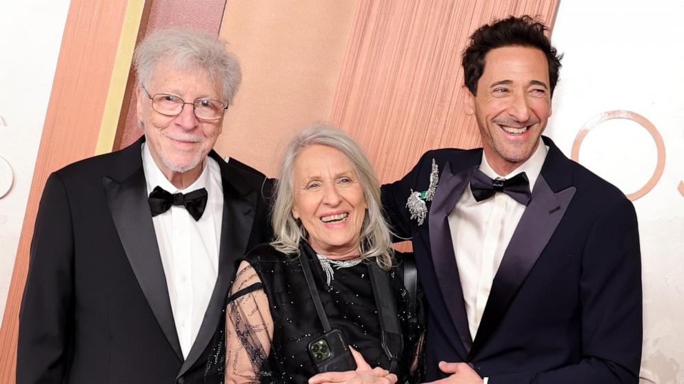 PHOTO: Elliot Brody, Sylvia Plachy, and Adrien Brody attend the 97th Annual Oscars at Dolby Theatre, Mar. 02, 2025, in Hollywood, Calif.