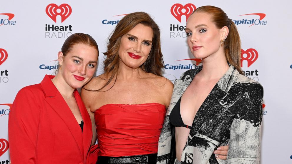 PHOTO: (L-R) Rowan Francis Henchy, Brooke Shields and Grier Hammond Henchy attend the iHeartRadio Z100s Jingle Ball 2022 Presented by Capital One at Madison Square Garden December 9, 2022 in New York, New York.