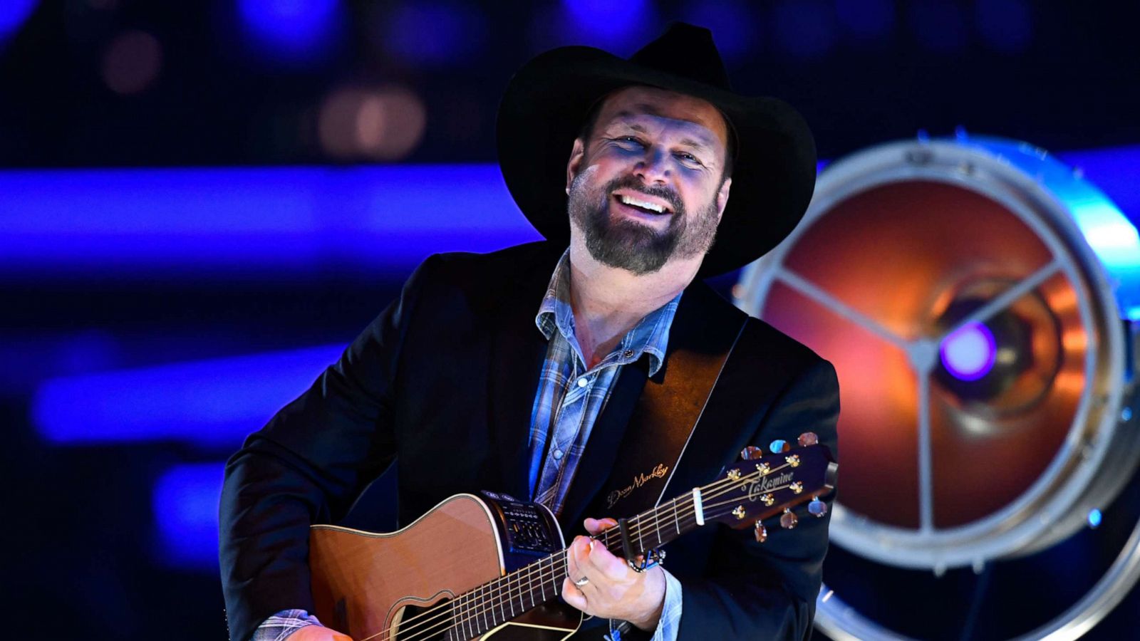 PHOTO: Garth Brooks performs onstage during MusiCares Person of the Year honoring Dolly Parton at Los Angeles Convention Center on February 8, 2019 in Los Angeles, California.