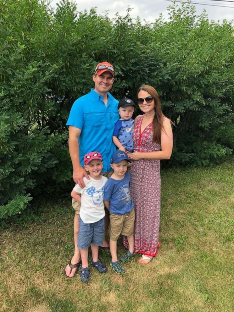 PHOTO: Levi, 4, Logan, 3 and Landon Daniels, 18 months, pose in an undated photo with their parents, Andrew and Marika Daniels.