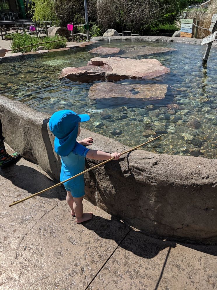 PHOTO: Landon Daniels, 18 months, fishes in a pond at a children's museum in South Dakota. 