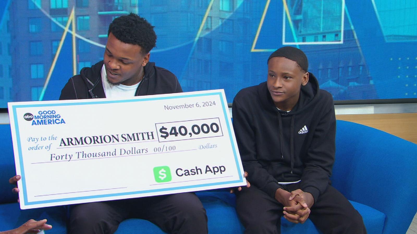 PHOTO: Armorion Smith and his brother Armond get surprised on the "Good Morning America" set in New York on Nov. 6, 2024.