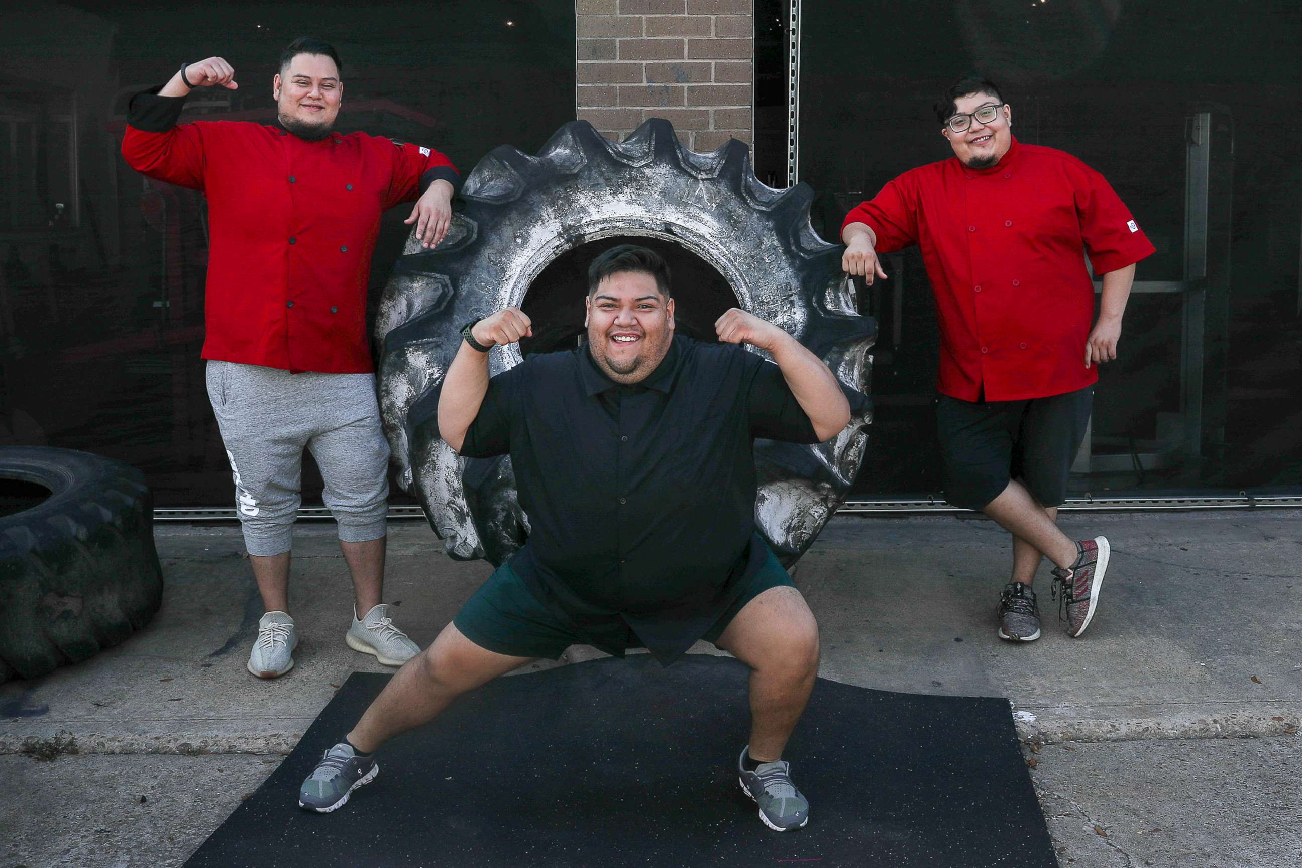 PHOTO: Abe Pena, from left, and his brothers Gustavo Pena and Rudy Pena pose for a portrait, Aug. 6, 2020, at Texas Elite Fitness in Houston.