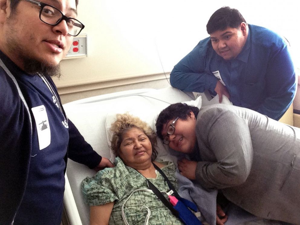PHOTO: Abe, Gus and Rudy Pena pose with their mother before her death, in this undated photo.