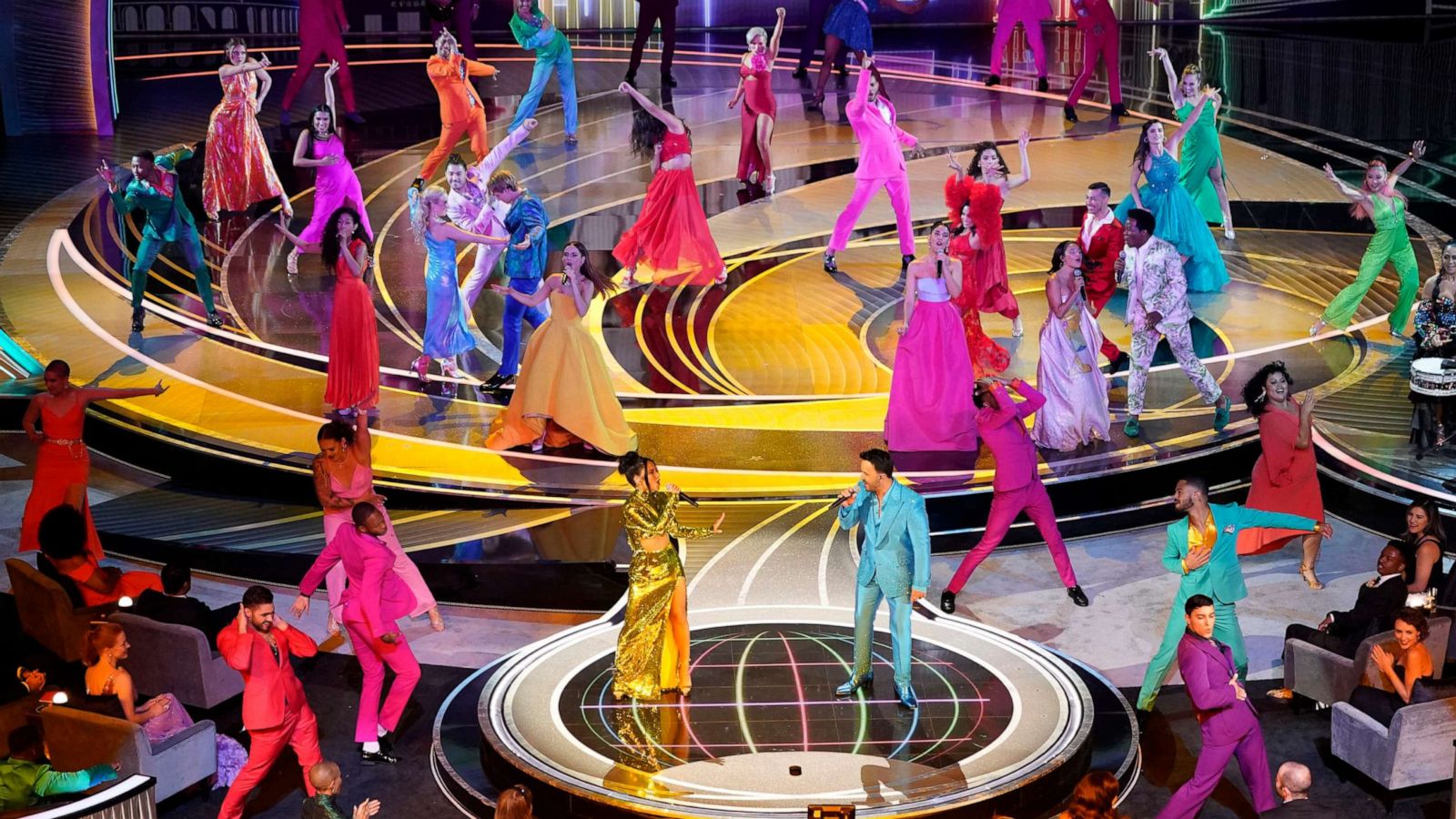 PHOTO: Becky G, center left, and Luis Fonsi, center right, perform "We Don't Talk About Bruno" from "Encanto" at the Oscars, March 27, 2022, at the Dolby Theatre in Los Angeles.