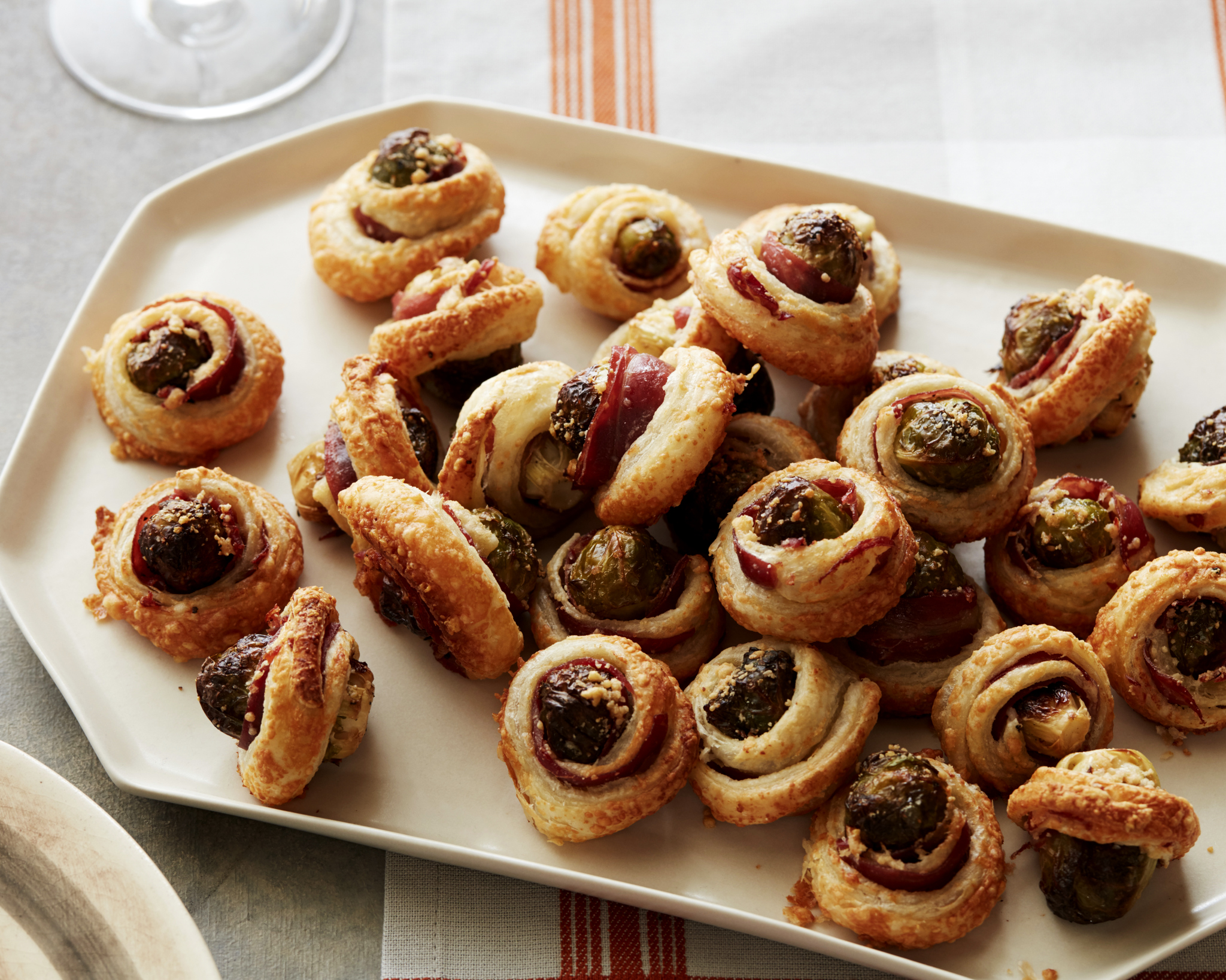 PHOTO: These Brussels sprouts are a fun fall twist on pigs-in-a-blanket with Parmesan cheese and puff pastry.