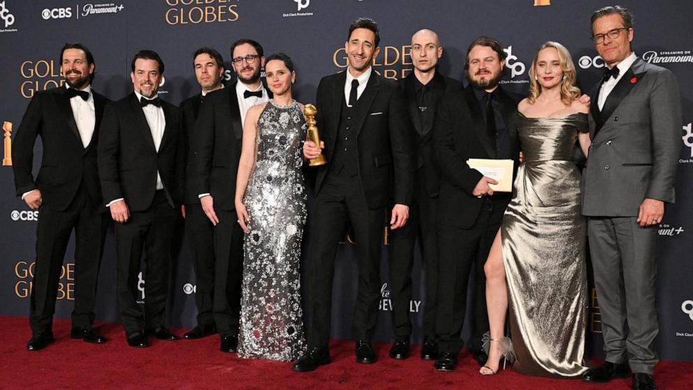 PHOTO: The cast of "The Brutalist pose with director Brady Corbet after winning Best Motion Picture - Drama at the 82nd annual Golden Globe Awards in Beverly Hills, Calif., Jan. 5, 2025. 