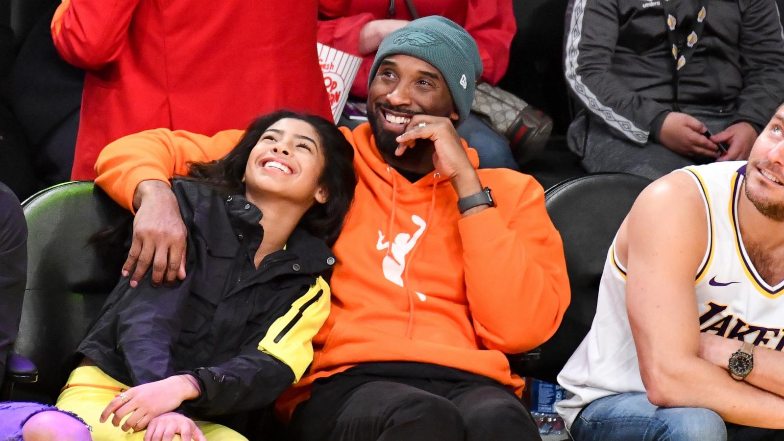 PHOTO: Kobe Bryant and daughter Gianna Bryant attend a basketball game between the Los Angeles Lakers and the Dallas Mavericks at Staples Center, Dec. 29, 2019, in Los Angeles.