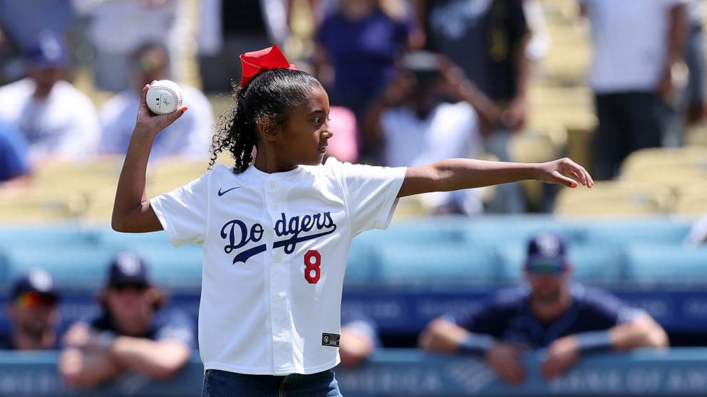 PHOTO: Bianka Bryant throws out the first pitch prior to the game between the Los Angeles Dodgers and the Tampa Bay Rays at Dodger Stadium on Aug. 25, 2024 in Los Angeles.