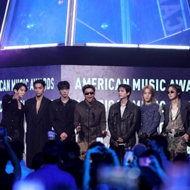 PHOTO: Jungkook, V, Jin, RM, Suga, Jimin and J-Hope of BTS speak onstage during the 52nd American Music Awards, May 25, 2026 in Las Vegas, Nevada.