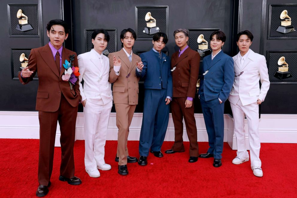 PHOTO: V, Suga, Jin, Jungkook, RM, Jimin and J-Hope of BTS attend the 64th GRAMMY Awards at MGM Grand Garden Arena, April 3, 2022, in Las Vegas. 