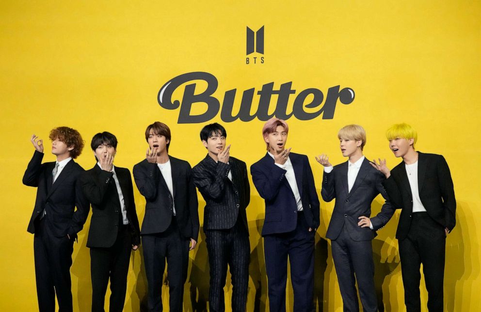 PHOTO: Members of South Korean K-pop band BTS pose for photographers ahead of a press conference to introduce their new single "Butter" in Seoul, May 21, 2021.