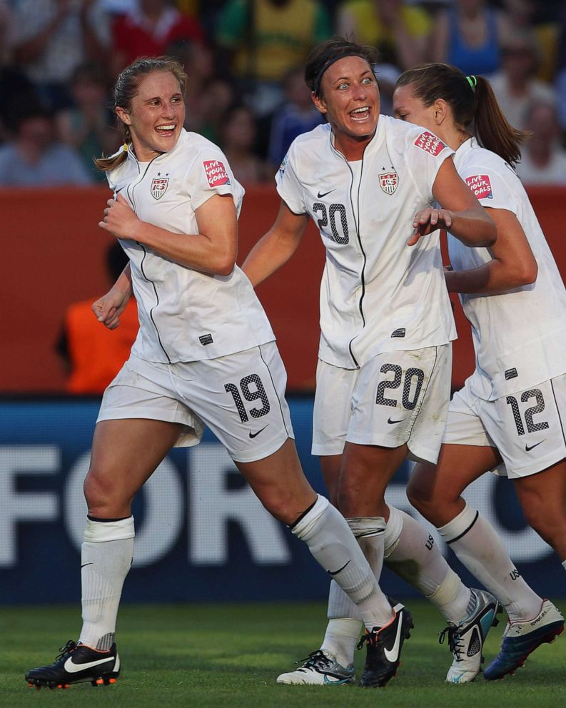 PHOTO: From left, Rachel Buehler, Abby Wambach and Alex Morgan celebrate Buehler's goal against Korea DPR during the FIFA Women's World Cup 2011 Group C match on June 28, 2011 in Dresden, Germany. 