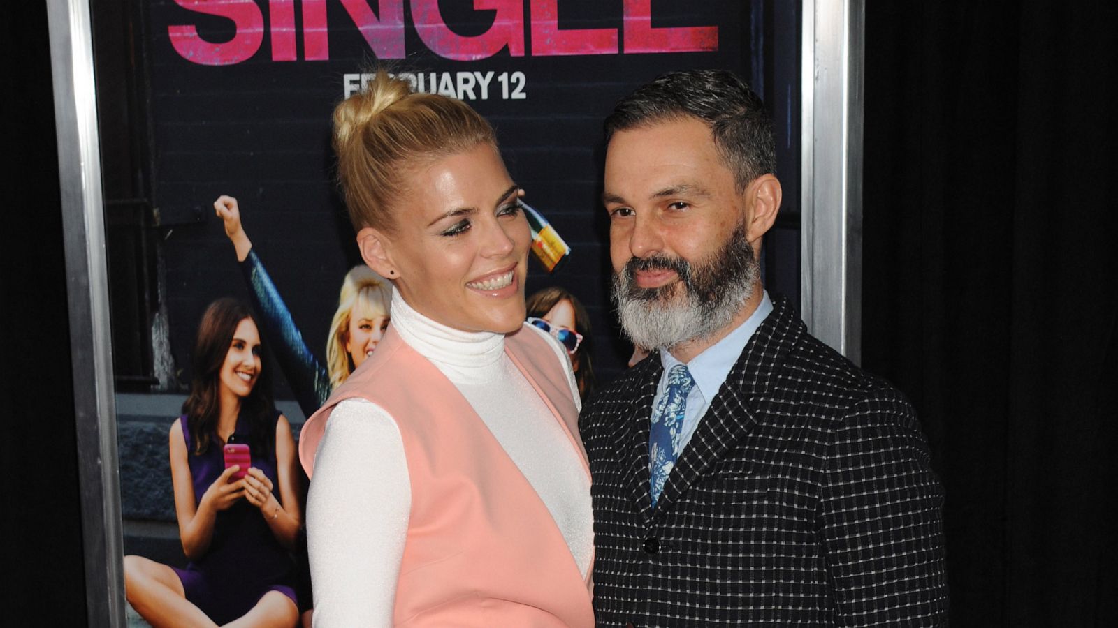 PHOTO: Actress Busy Phillips arrives with husband Marc Silverstein, on the red carpet for the World Premiere of the film "How To Be Single". in Los Angeles, Feb. 3, 2016.