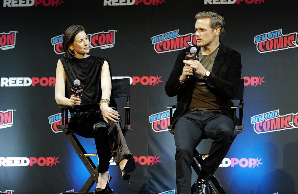 PHOTO: Caitriona Balfe and Sam Heughan speak onstage during the Outlanders Season Seven Part Two Preview at New York Comic Con 2024 at The Jacob K. Javits Convention Center on Oct. 17, 2024 in New York.