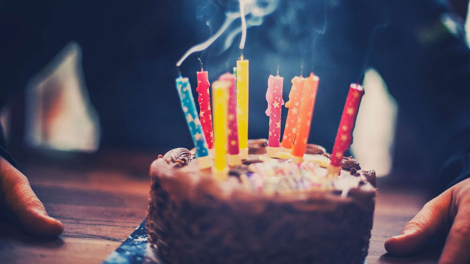 PHOTO: A birthday cake with the candles just blown out.