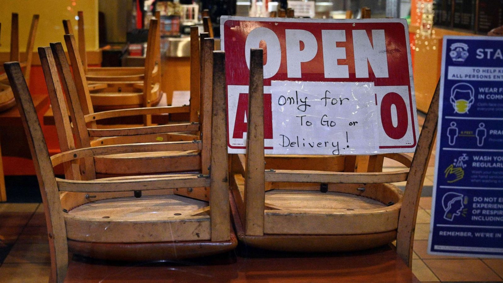 PHOTO: In this Nov. 23, 2020, file photo, employees work in a restaurant open for to-go or delivery orders only, in Burbank, Calif.