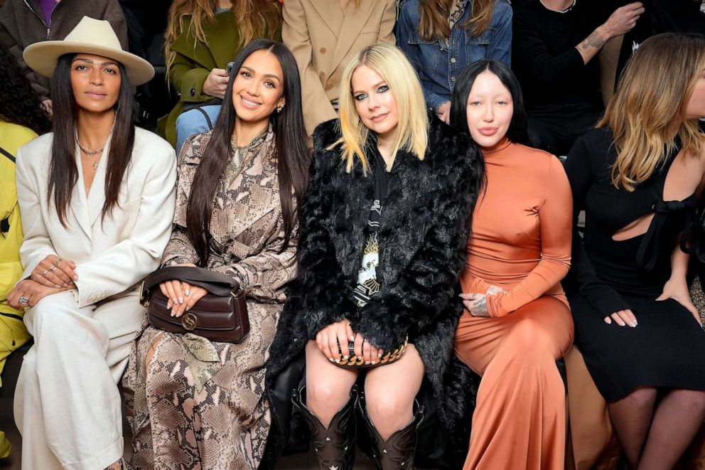PHOTO: Camila Alves McConaughey, Jessica Alba, Avril Lavigne, and Noah Cyrus at Stella McCartney Fall 2023 Ready To Wear Fashion Show, March 6, 2023 at the Military School Carousel in Paris.