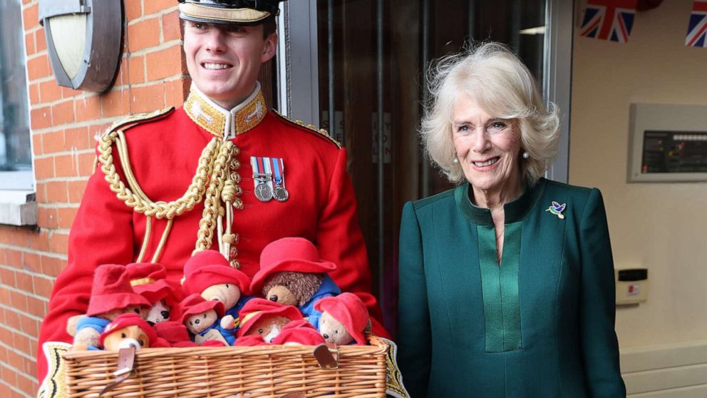 PHOTO: Camilla, Queen Consort delivered paddington bears and other cuddly toys that were left as tributes to Queen Elizabeth II to Barnardo's Nursery in London, Nov. 24, 2022.