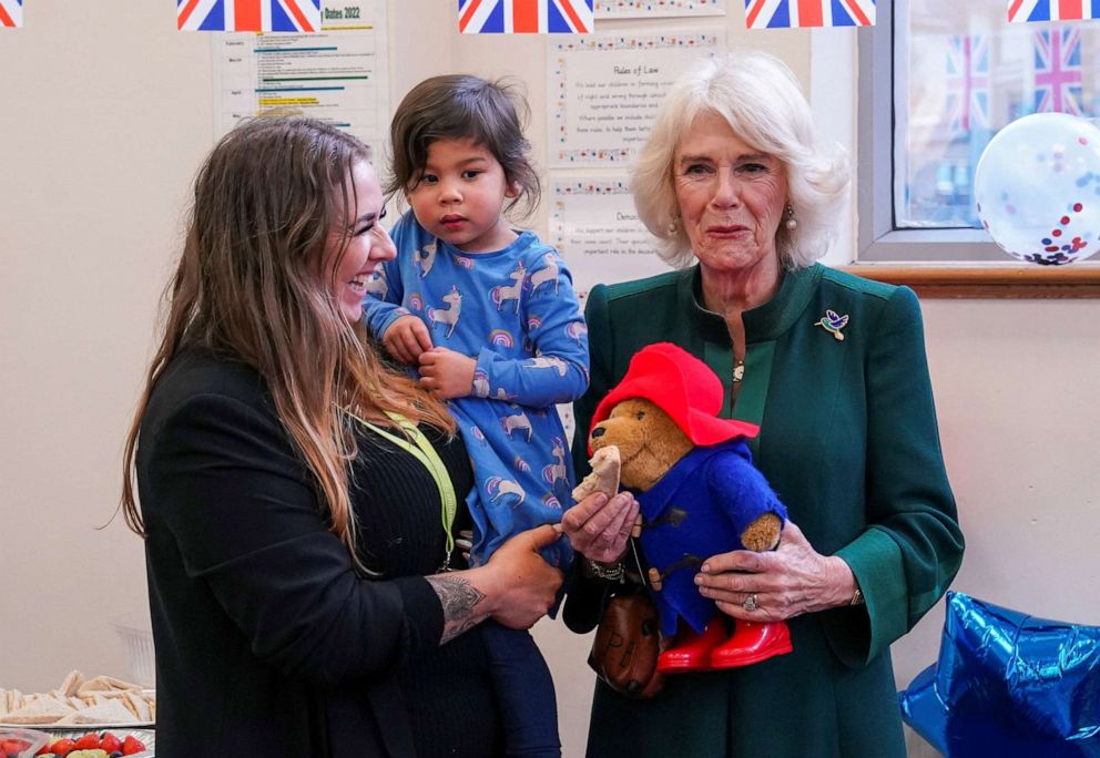 PHOTO: Camilla, the Queen consort, holds a Paddington bear during a visit to Barnardo's Nursery in London, Nov. 24, 2022. 