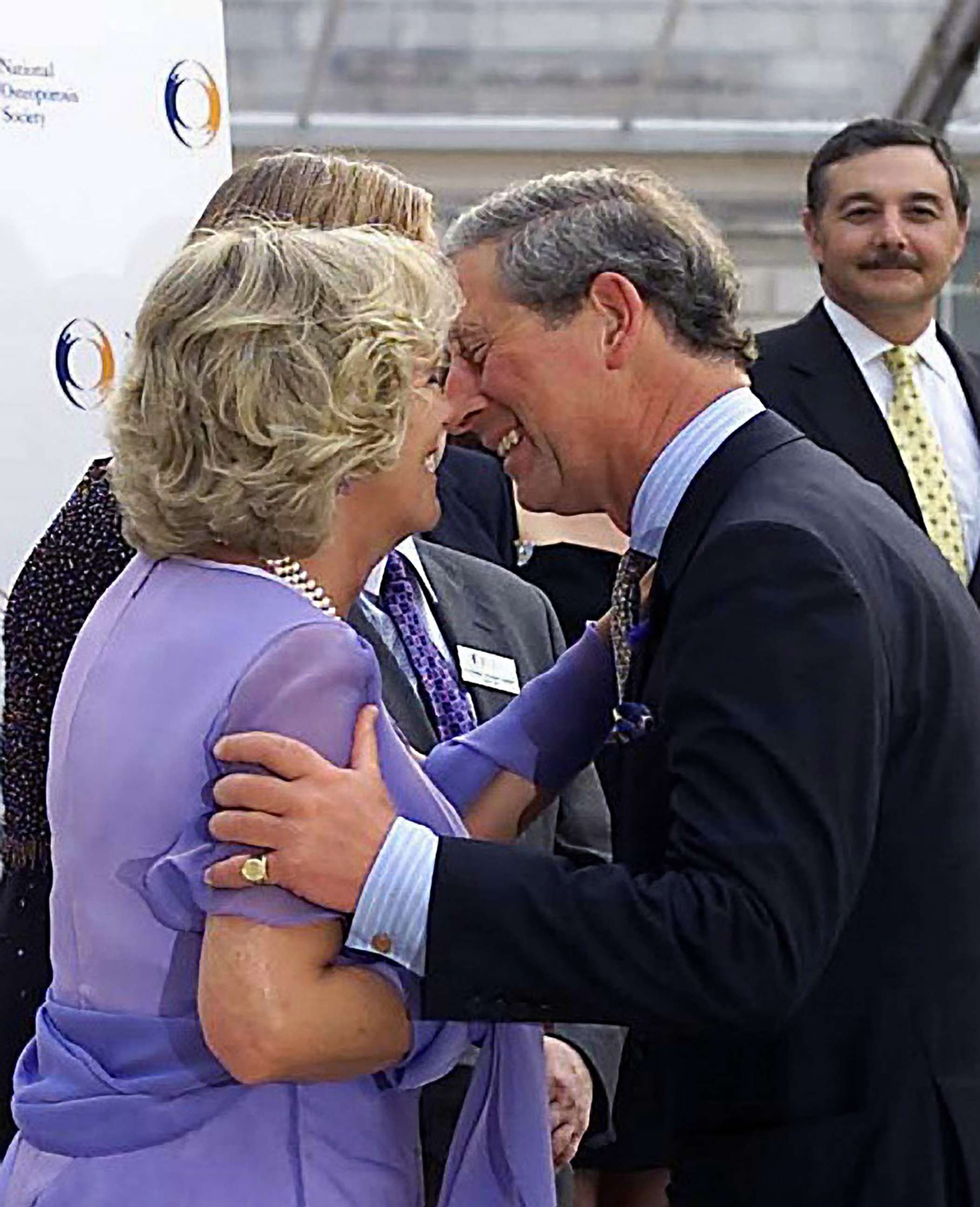 PHOTO: Camilla Parker-Bowles, in her official role as patron of the National Osteoporosis Society, welcomes Prince Charles with a kiss to the anniversary event at Somerset House in London, June 26, 2001.