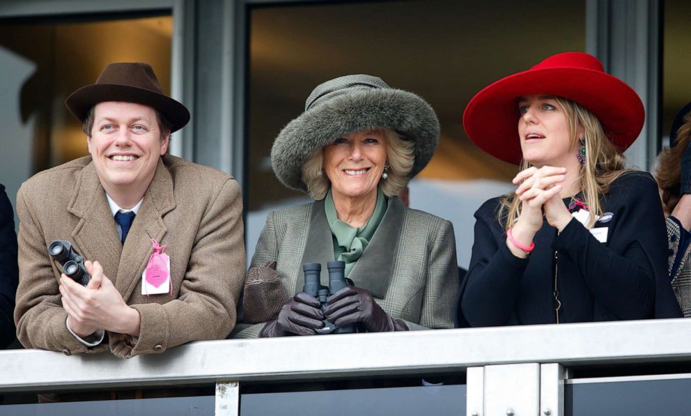 PHOTO: Camilla, Duchess of Cornwall is joined by her son Tom Parker Bowles and daughter Laura Lopes watch the racing in Cheltenham, England, March 11, 2015.