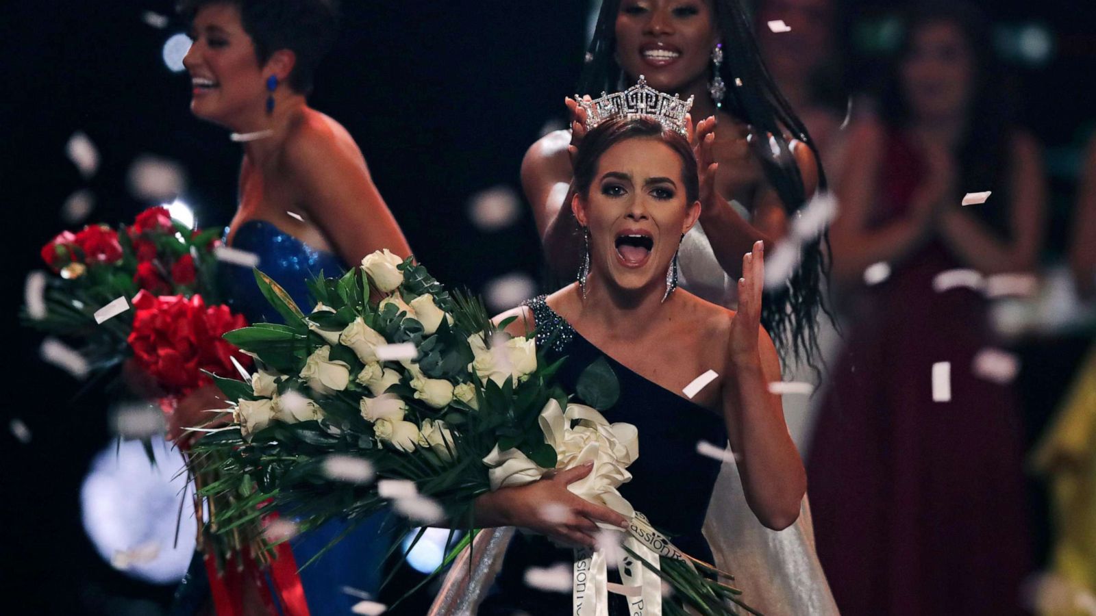 PHOTO: Camille Schrier, of Virginia, right, reacts after winning the Miss America competition at the Mohegan Sun casino in Uncasville, Conn., Thursday, Dec. 19, 2019.