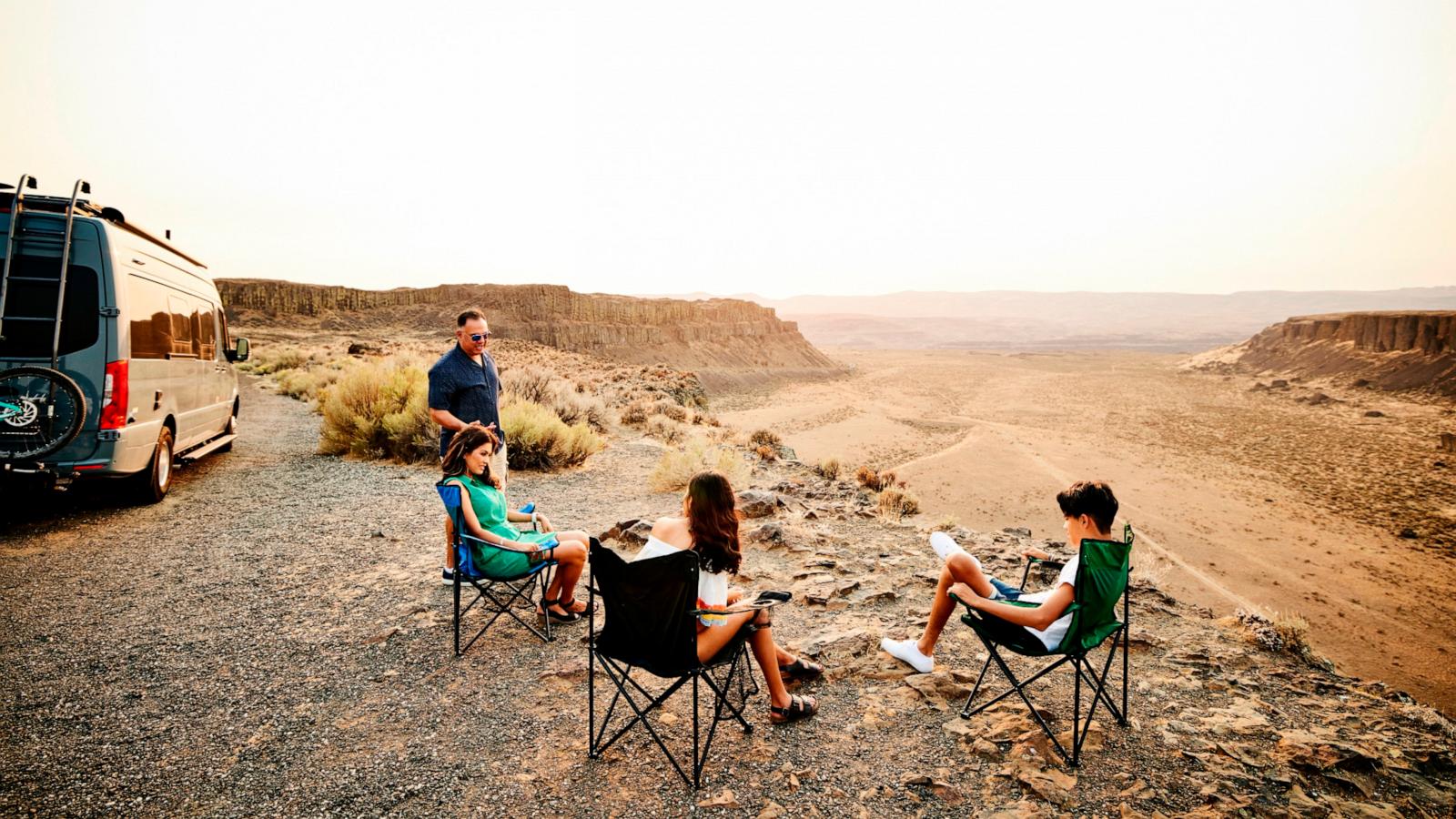 PHOTO: Stock photo of a group of people camping.