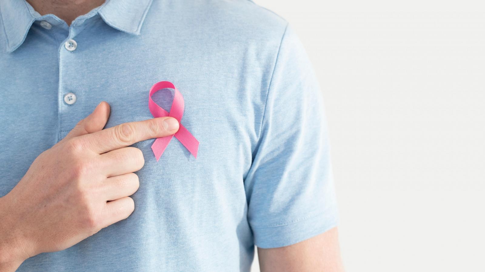 PHOTO: A man wears a breast cancer ribbon in an undated stock photo.
