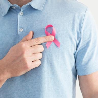 PHOTO: A man wears a breast cancer ribbon in an undated stock photo. 