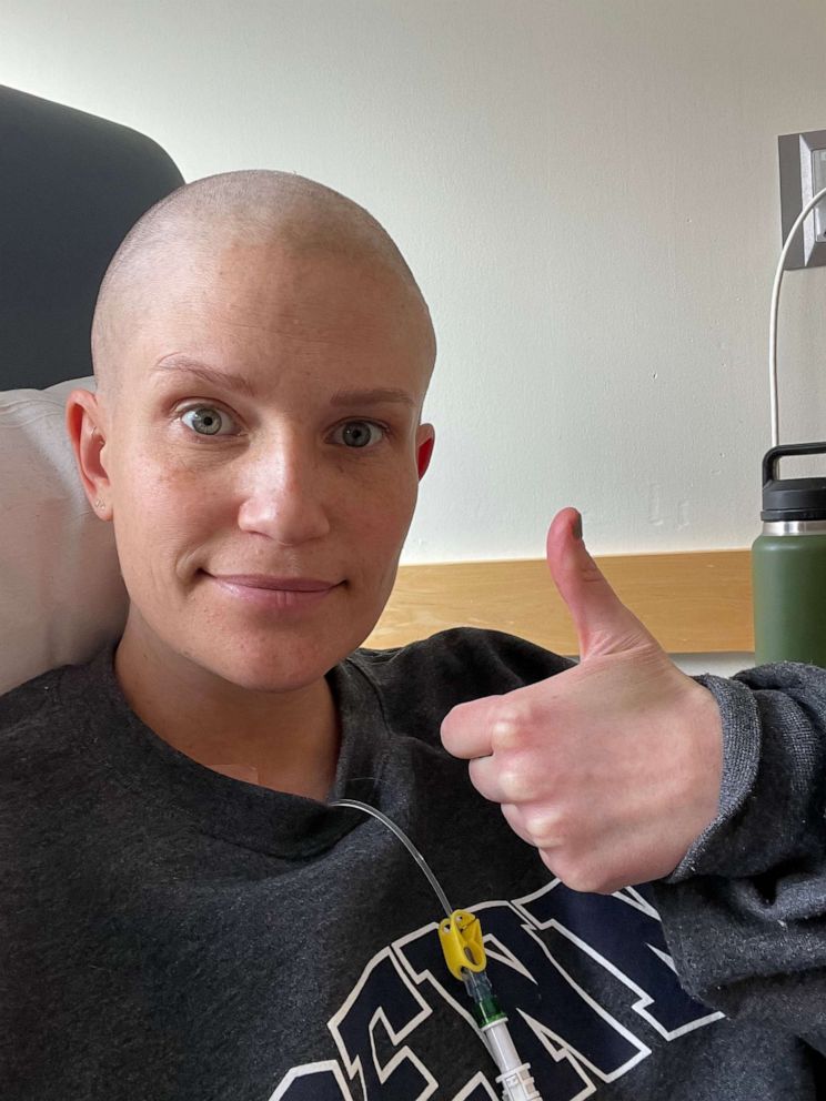 PHOTO: Kate Korson give a thumbs up while undergoing treatment for stage 3, triple-negative breast cancer.