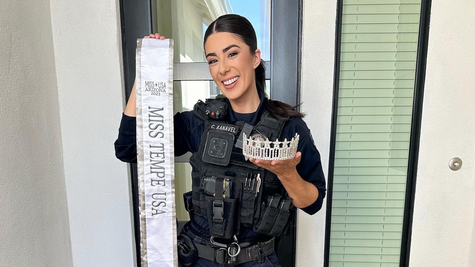 PHOTO: In a photo posted to her Instagram account, Candace Kanavel is seen holding her tiara and sash while wearing her police uniform.