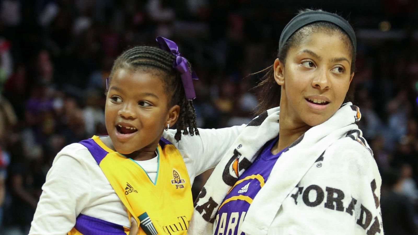 PHOTO: Los Angeles Sparks forward Candace Parker holds her daughter Lailaa Nicole Williams after a game in Los Angeles, Sept. 30, 2016.