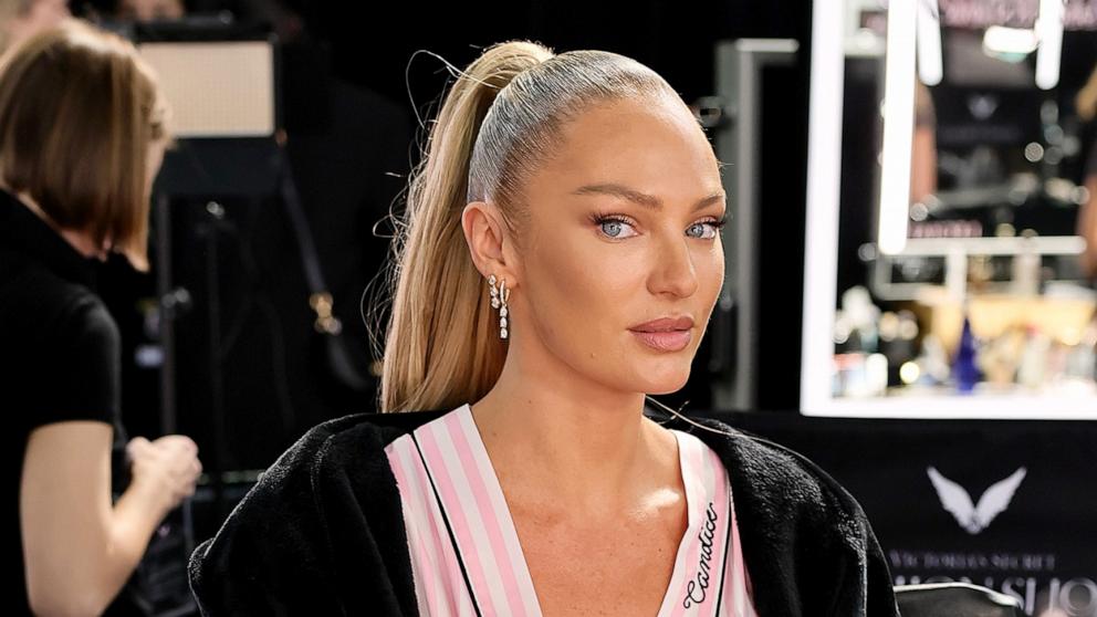 PHOTO: Candice Swanepoel prepares backstage at the Victoria's Secret Fashion Show 2024 at Duggal Greenhouse on Oct. 15, 2024, in Brooklyn, New York.