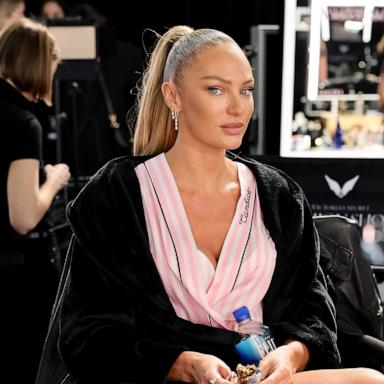 PHOTO: Candice Swanepoel prepares backstage at the Victoria's Secret Fashion Show 2024 at Duggal Greenhouse on Oct. 15, 2024, in Brooklyn, New York.