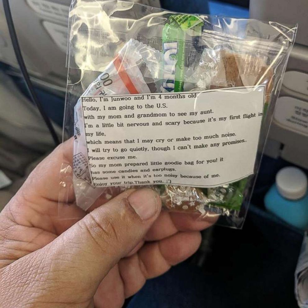 mom explains why her husband doesn't sit with her and kids on flight