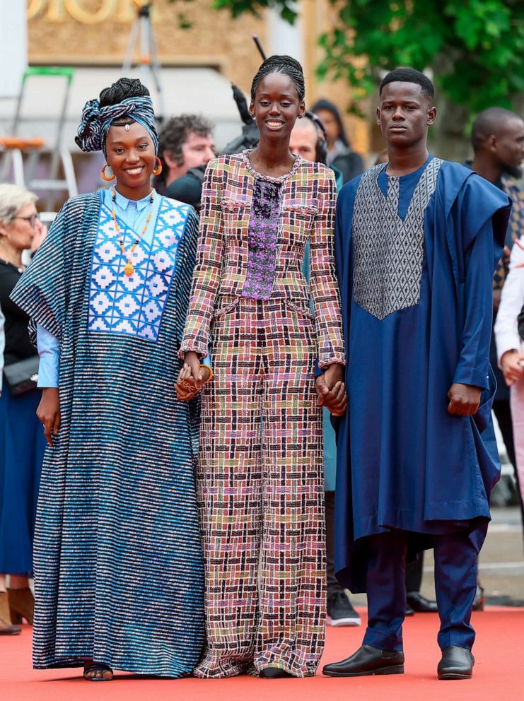 PHOTO: Khady Mane, Director Ramata-Toulaye Sy and Mamadou Diallo attend the "Banel E Adama" red carpet during the 76th annual Cannes film festival at Palais des Festivals, May 20, 2023, in Cannes, France.
