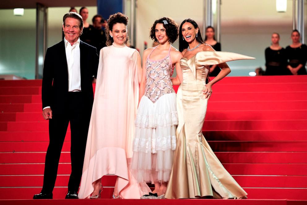 PHOTO: (From L) US actor Dennis Quaid, French director Coralie Fargeat, US actress Margaret Qualley and US actress Demi Moore arrive for the screening of the film "The Substance" at the 77th edition of the Cannes Film Festival on May 19, 2024. 