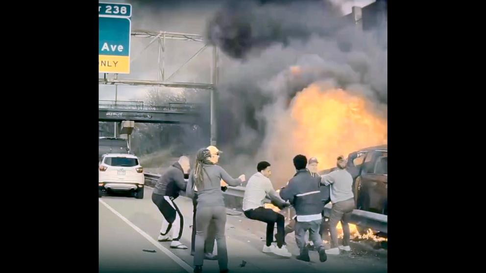VIDEO: Good Samaritans rescue man trapped inside SUV in fiery crash
