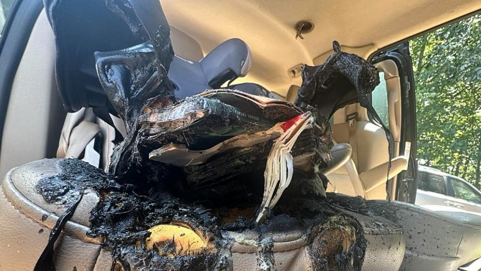 PHOTO: The George Hildebran Fire & Rescue Department in North Carolina shared photos on Facebook of a child's car seat that caught fire due to a battery inside a children's book.