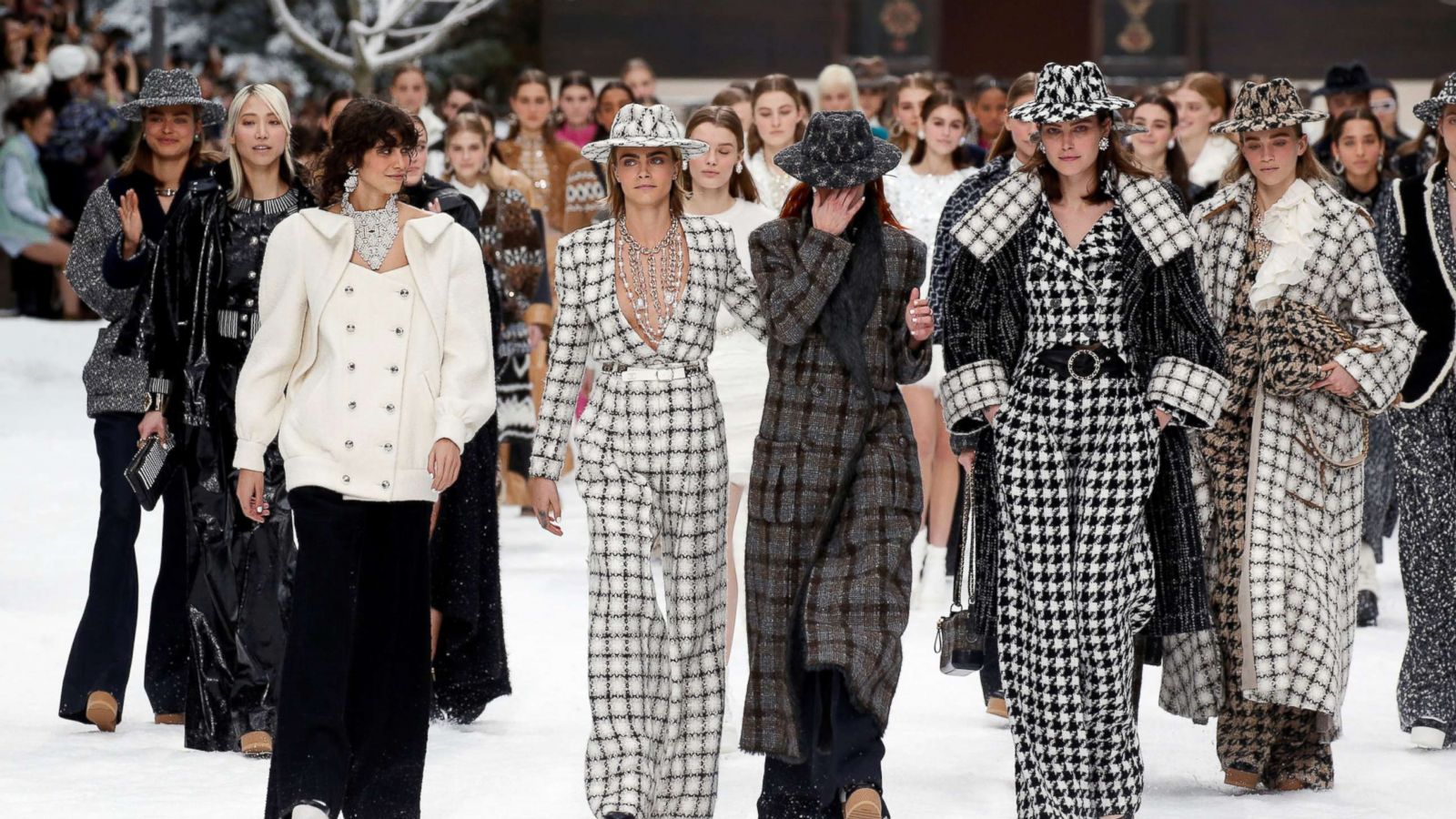 PHOTO: Cara Delevingne and other models react while presenting creations by late designer Karl Lagerfeld as part of his Fall/Winter 2019-2020, during Paris Fashion Week in Paris, March 5, 2019.