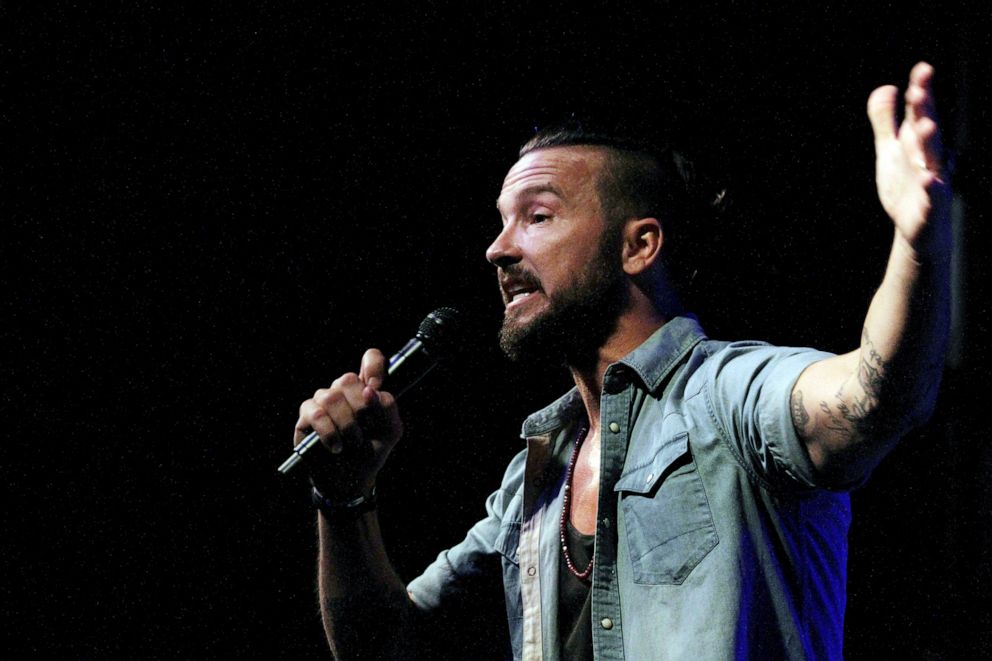 PHOTO:  Pastor Carl Lentz leads a Hillsong NYC Church service at Irving Plaza in New York, July 14, 2013.