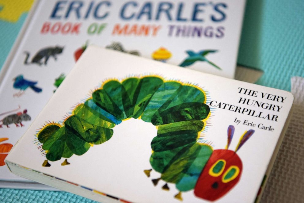 PHOTO: This photo illustration taken, May 26, 2021, shows Eric Carle's "The Very Hungry Caterpillar" and "Book of Many Things" in Los Angeles.