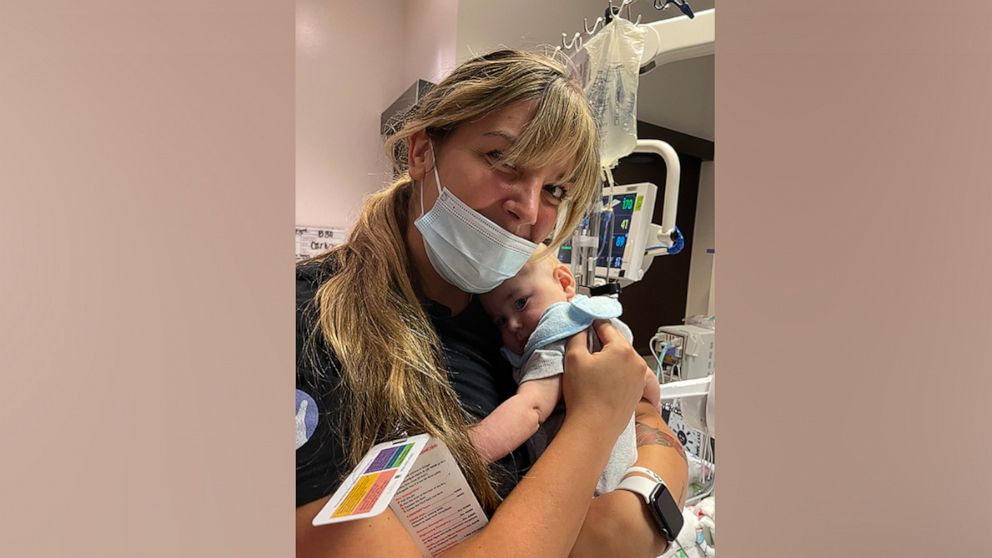 PHOTO: Carly Miller, a NICU nurse at Texas Children's Hospital, holds baby Conrad.