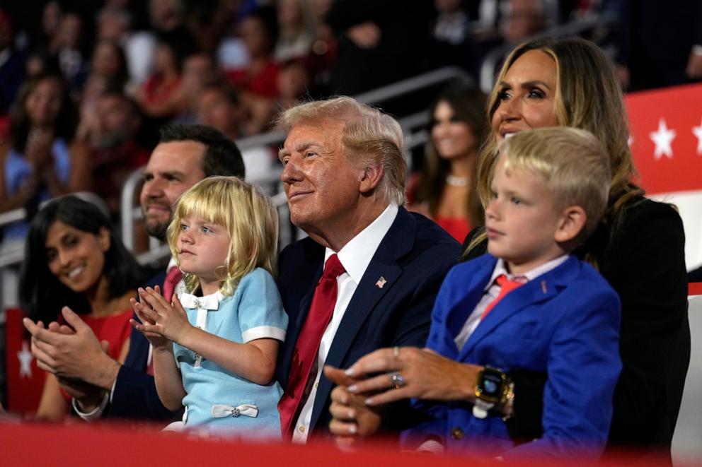 PHOTO: Republican presidential candidate former President Donald Trump sits with Lara Trump and her children Luke and Carolina during the 2024 Republican National Convention, July 18, 2024, in Milwaukee. 