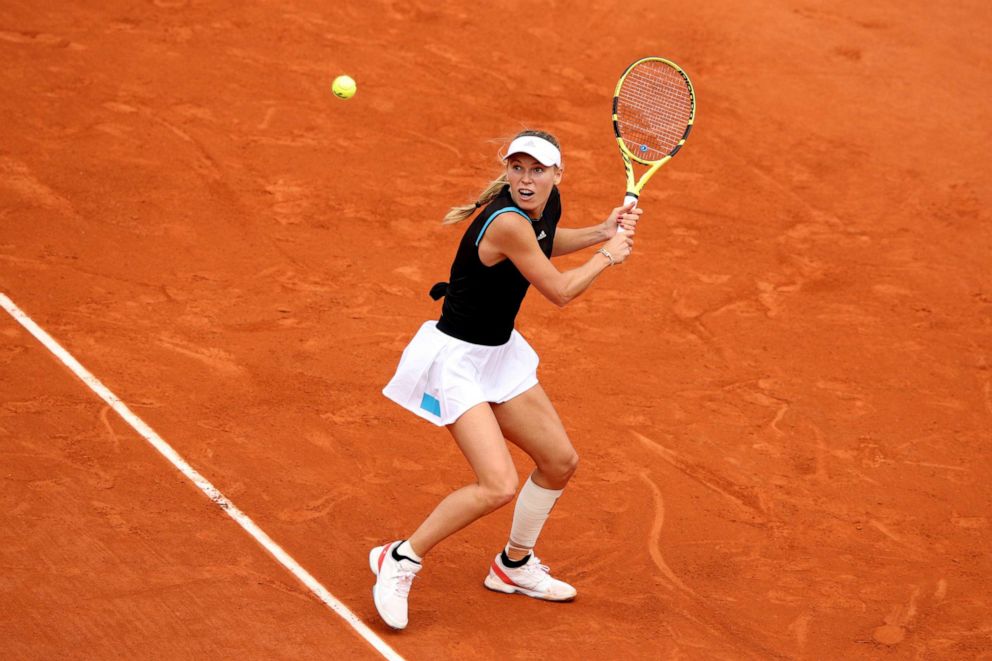 PHOTO: Caroline Wozniacki of Denmark plays a backhand during her ladies singles first round match against Veronika Kudermetova of Russia during Day two of the 2019 French Open at Roland Garros, May 27, 2019, in Paris.