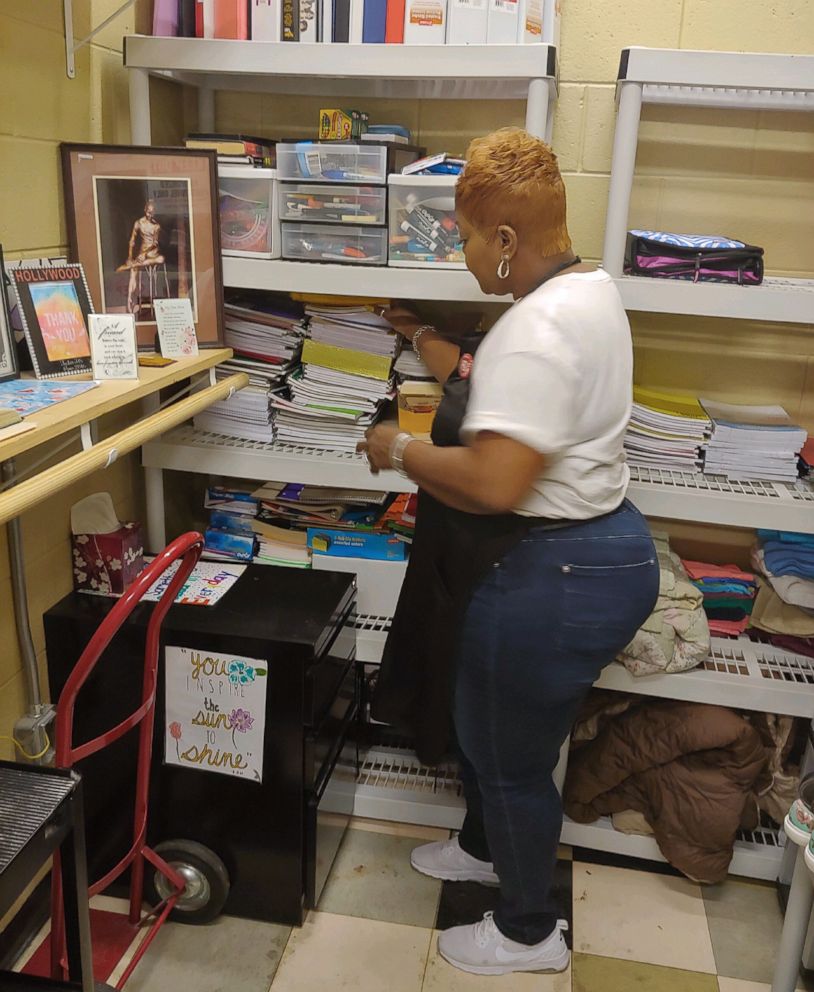 PHOTO: Carolyn Collins, a custodian at Tucker High School in Tucker, Ga., gives clothes, school supplies and snacks to less fortunate students.
