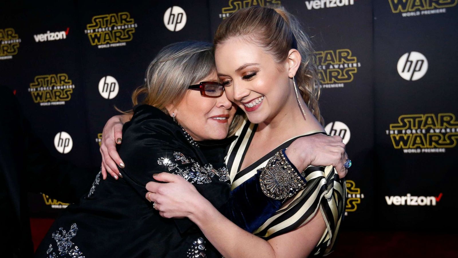 PHOTO: Actresses Carrie Fisher (L) and Billie Lourd embrace as they arrive at the premiere of "Star Wars: The Force Awakens" in Hollywood, Calif., December 14, 2015.